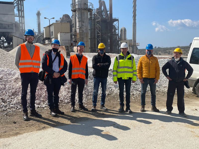 CERE and Grecian Magnesite contacts in front of the rotary kiln process plant. The plant rotary kilns produce 50 MW of thermal heat.